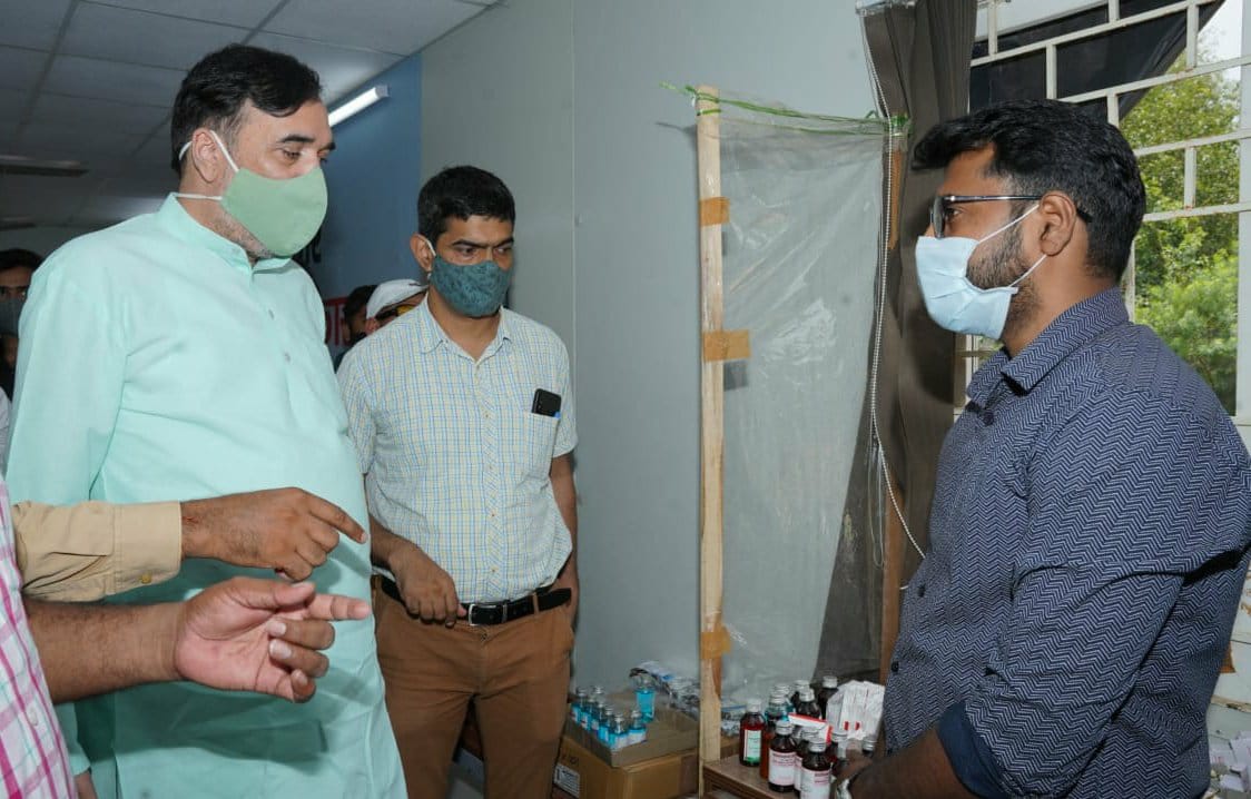 Gopal Rai inspects a Ration Distribution Center and Mohalla Clinic in Babarpur