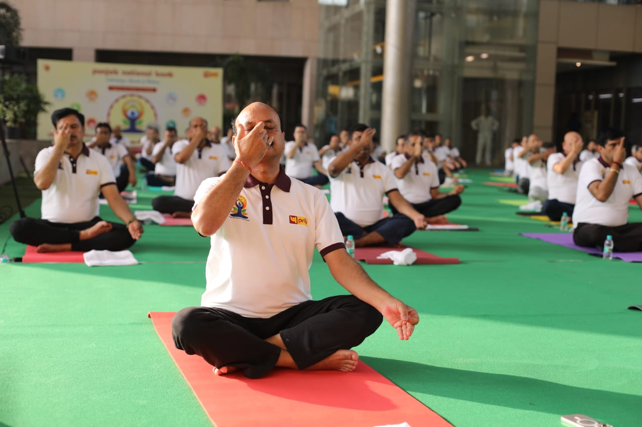 Banking on Wellness: PNB Marks Yoga Day with Green Commitment